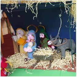 An unusual Nativity scene in the window of our Oasis Community Centre. All of the characters in the colourful display, which is at child height, are knitted! 